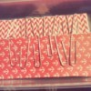 Paper clips on the edge of a homemade journal.