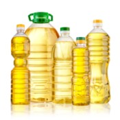 Different sized bottles of cooking oil.
