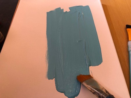 Pistachio Shell Birds Painting - use a wide brush to paint the canvas blue, allow to dry