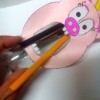 Recycled Animal Face Pencil Case - pencils fit inside the bottle