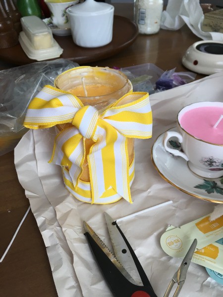 Teacup Candles - adding a ribbon bow to a jar candle