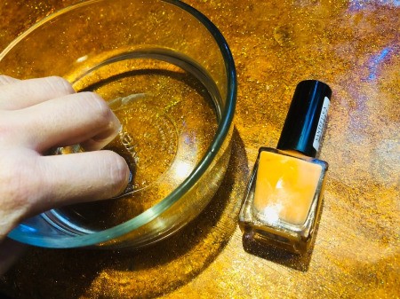 Using a vinegar soak before applying nail polish.