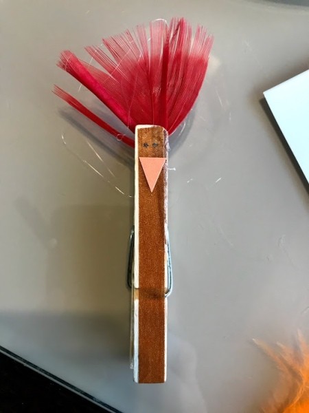 Clothespin Chicken Plant Decoration - red feather as seen from the front