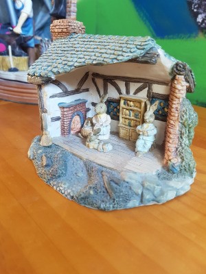 Identifying an Ornament or Figurine - open front cottage with bunny family inside