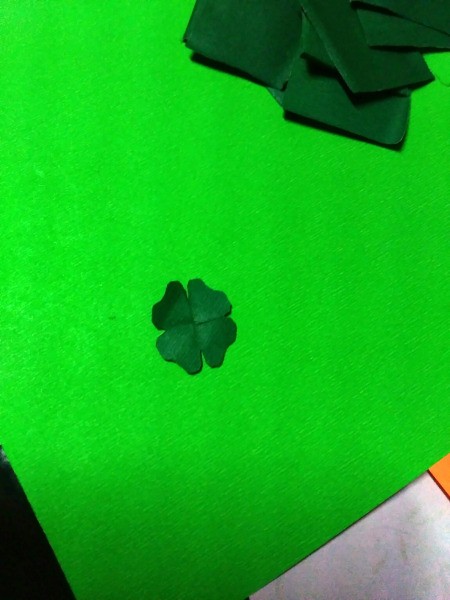 Mini Shamrock Hat Basket - open the folds to reveal a four leaf clover