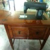 Finding Attachments for a Vintage Kenmore Sewing Machine - machine in a wood cabinet