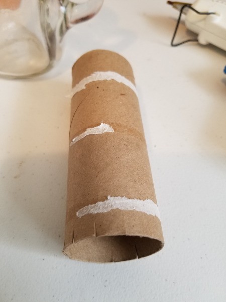 Vase of Many Colors - cut slits into a tp tube