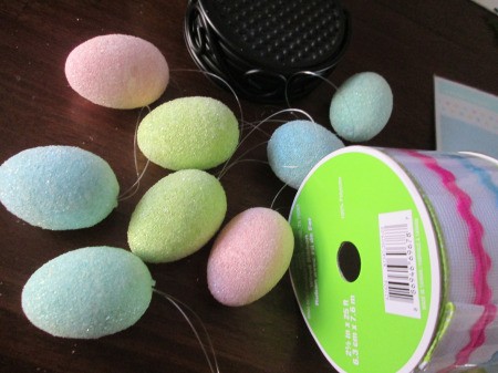 Vinyl Tablecloth Wreath - ribbon roll and pastel eggs