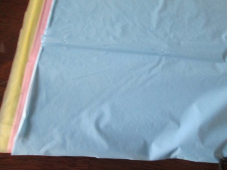 Vinyl Tablecloth Wreath - lay the cloths on top of each other