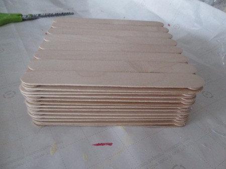Craft Stick Basket - glue a single layer to create the bottom