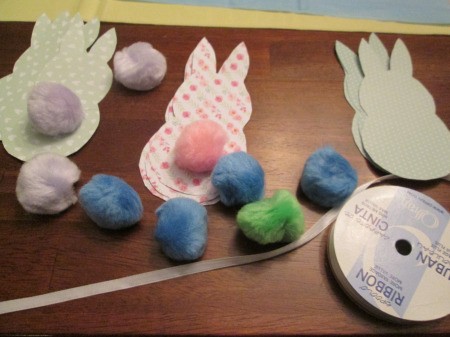 Spring Bunny Banner - arrange bunnies on narrow ribbon, tape or glue in place and then add tails