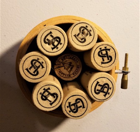 Recycled Cork Thread Dispenser and a Candle Holder - mini hoop with 7 corks and a half cork down in the center