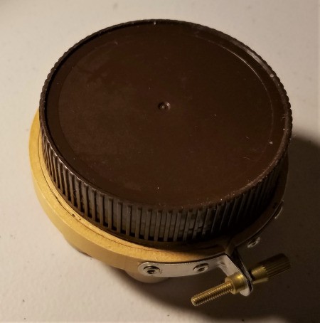 Recycled Cork Thread Dispenser and a Candle Holder - set the corks that protrude below the hoop in the lid - can be glued in place