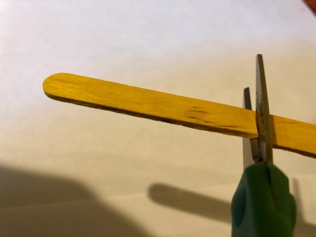 Pot O' Gold Piggy Bank - cut a Popsicle stick in half