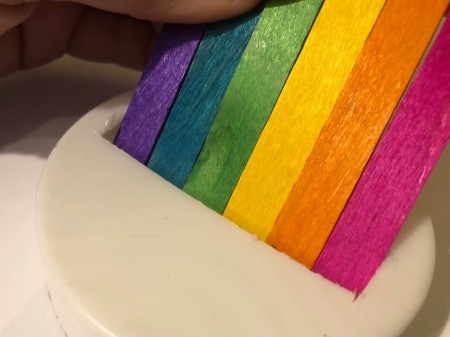 Pot O' Gold Piggy Bank - the slit needs to be long enough for the rainbow sticks and wide enough to allow a coin to slide into the jar past the sticks