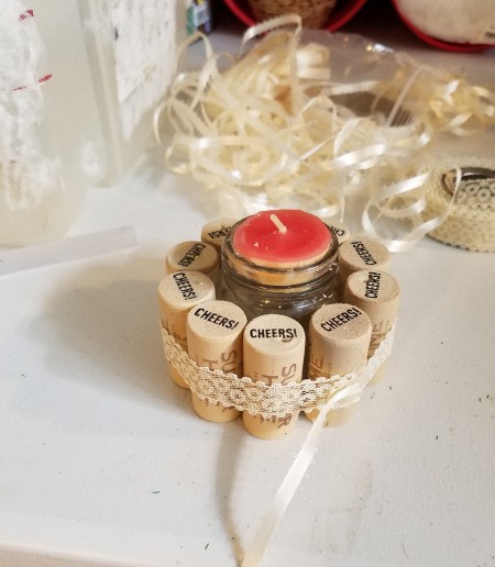 Recycled Cork Thread Dispenser and a Candle Holder - add a length of narrow ribbon over the lace