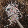 Homemade Compost - The Natural Way To Green Gardening - mixing materials with a rake
