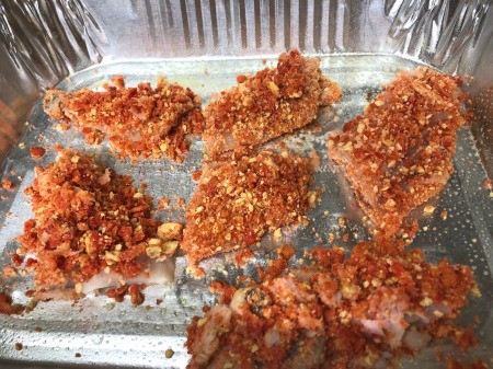 breaded fish in pan