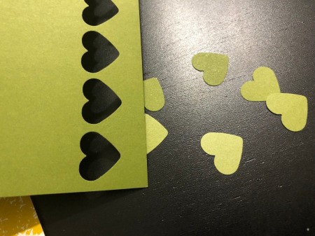 One of a Kind Clover Card - repeat punching hearts from other shades of green paper