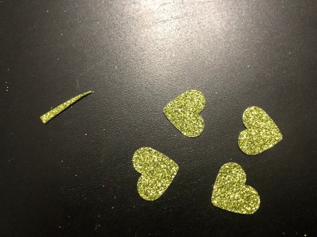 One of a Kind Clover Card - punch out 4 hearts from the glitter paper and cut one stem