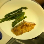 Garlic Parmesan Salmon with asparagus on plate