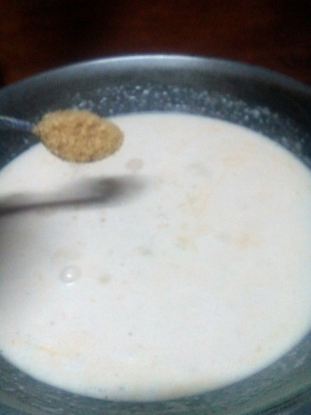 adding sugar to Coconut Milk