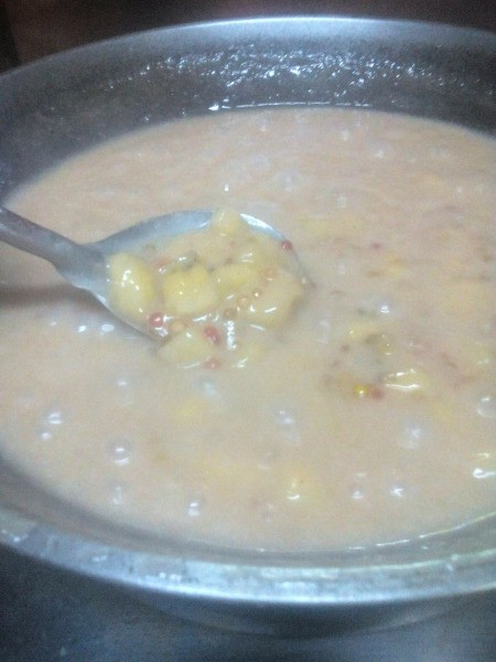 stirring Rice Balls in Coconut Milk
