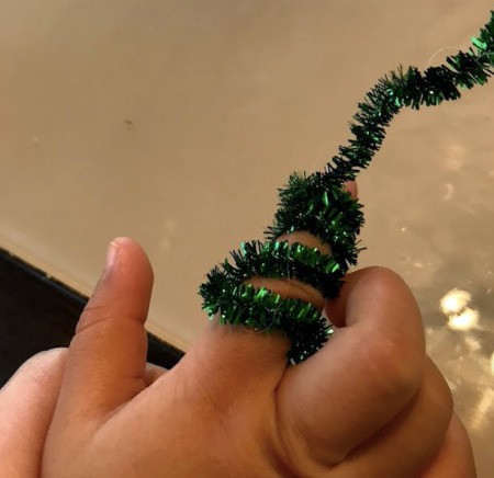 Easy Pom Pom Finger Puppet - wrap pipe cleaner around child's finger and cut off excess