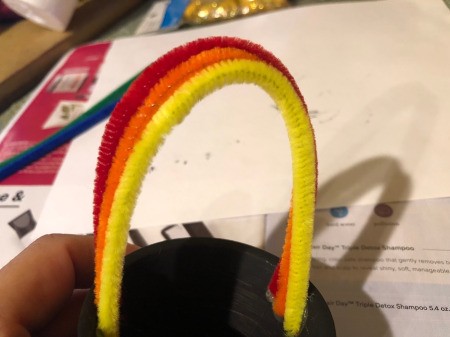 Pot O' Gold Planter - stick the pipe cleaners to the glue in rainbow order, repeat on the other side
