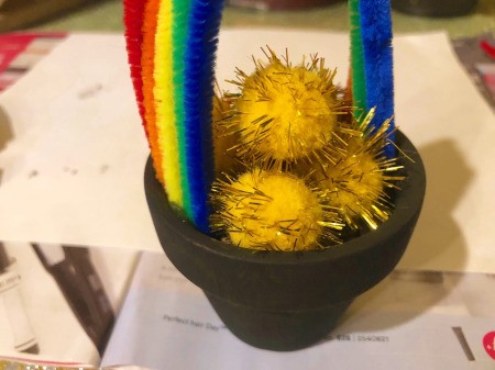 Pot O' Gold Planter - add treat and then top with the gold pom poms