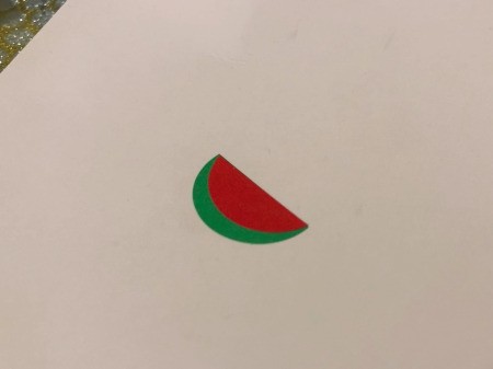Making a Watermelon Card from Round Labels - place the red and yellow stickers on the green ones to make the melon slices