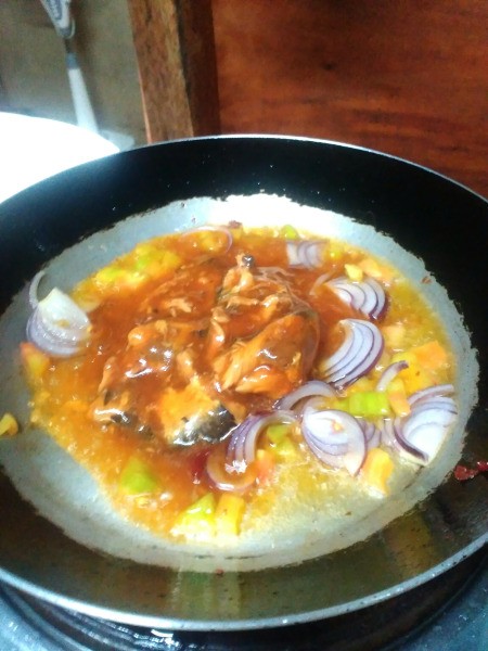 sauce added to to tomatoes & onions