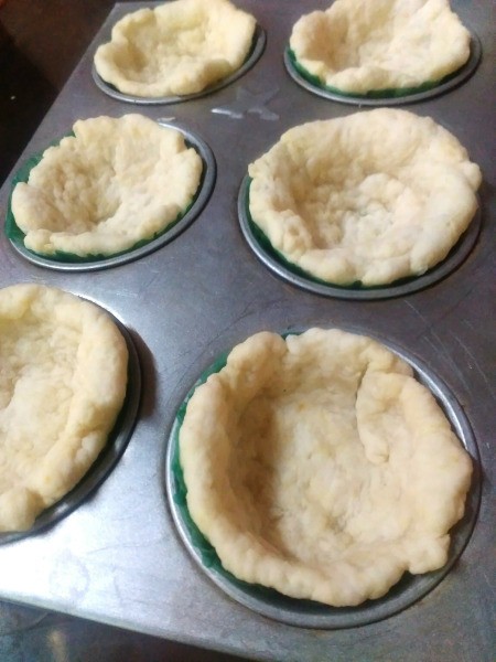 baked dough in cups