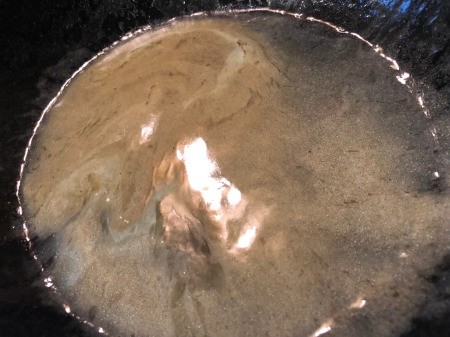 melted butter in pan