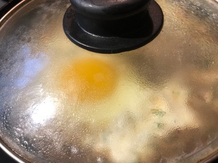 covered pan of Parmesan Eggs
