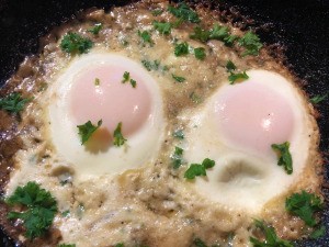 Crispy Parmesan Eggs in pan