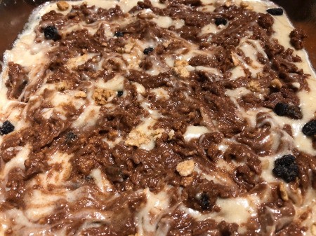 sprinkling top of batter with topping mixture