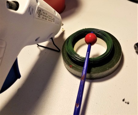 Making a Flower Pot Candy Dish - paint the wooden bead for the handle on the top