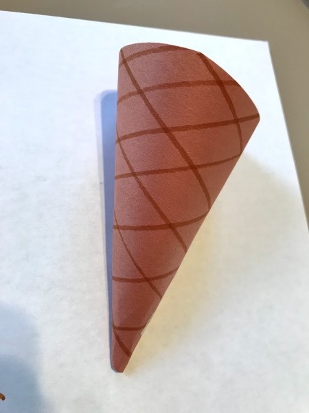 Making Paper Ice Cream Cones - roll and tape to make cone