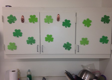 Foam Shamrock Decor Ideas - shamrocks stuck to cabinets