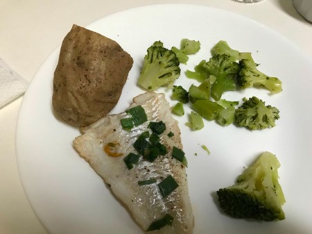 Steamed Cod , potato & broccoli on plate