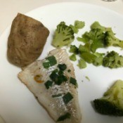 Steamed Cod , potato & broccoli on plate