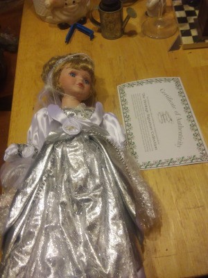 Value of a Heritage Signature Collection Doll - doll wearing a silver dress