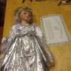 Value of a Heritage Signature Collection Doll - doll wearing a silver dress