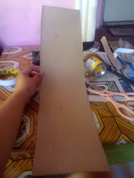 Making an Egyptian Headdress - glue the ends of the two pieces together