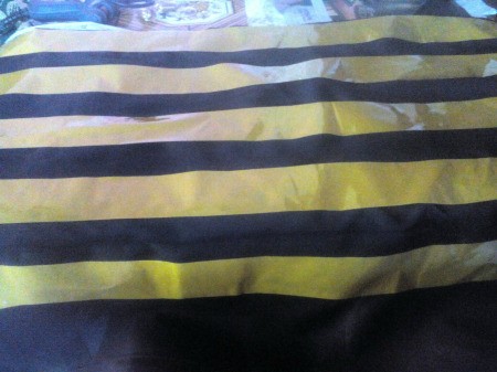 Making an Egyptian Headdress - stick tape down on black fabric