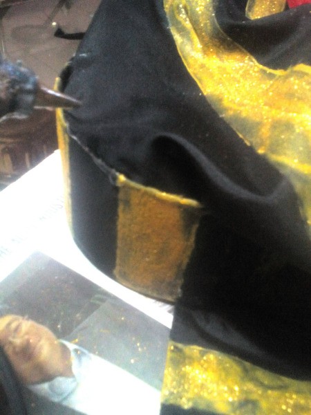 Making an Egyptian Headdress - when paint has dried remove tape and attach the cloth to the circle/crown with hot glue