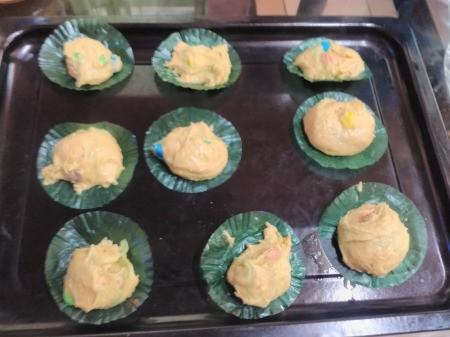 batter on papers on baking sheet