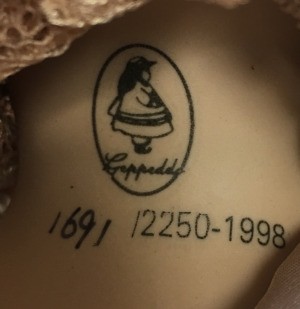 Value of a Geppeddo Porcelain Doll - markings on doll's neck