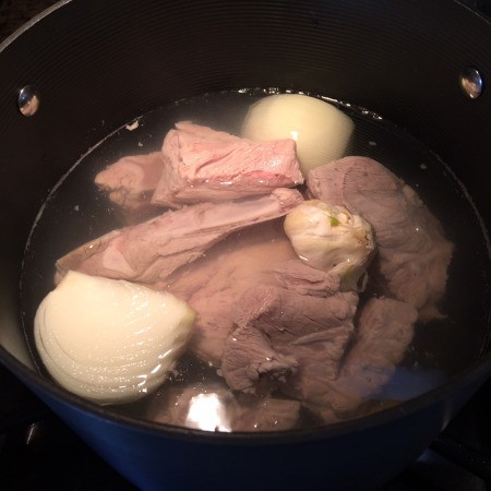 Pork added to pot
